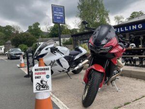 Bike Night at The Filling Station in Keswick. Bikes outside with designated parking