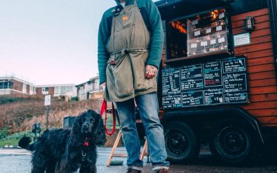 Larry's Coffee Standing Outside With Dog